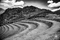 The terraces of Machu Picchu step down the forested slopes of the Andes in perfect alignment with the sun’s rays, holding a