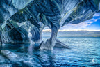 Thin marble column supporting a massive cave ceiling above General Carrera Lake in Chilean Patagonia.